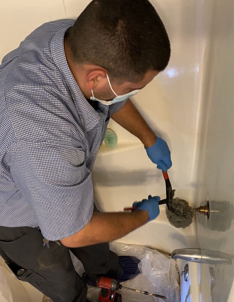 working on a shower in the bathroom