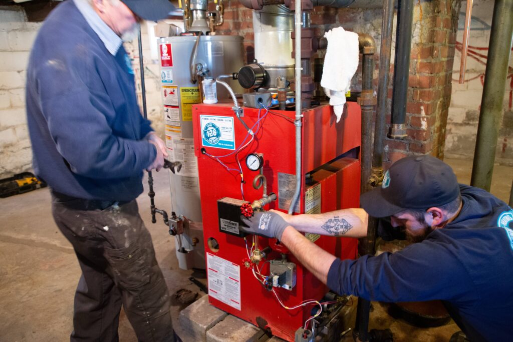 technicians-working-on-heating-systems 