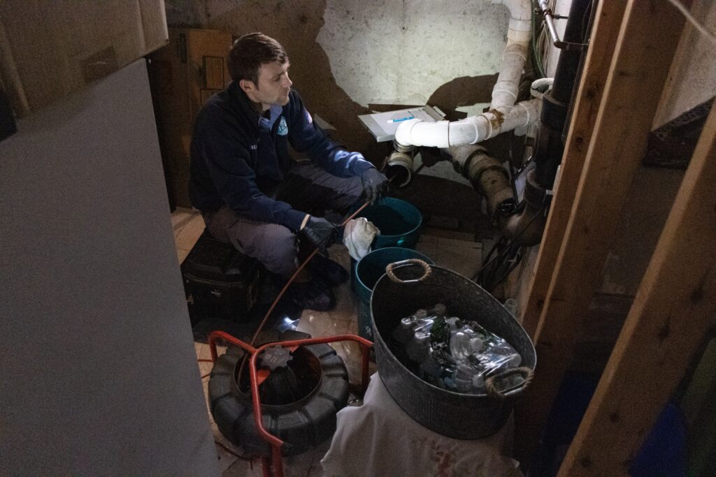 128 drain cleaning in progress