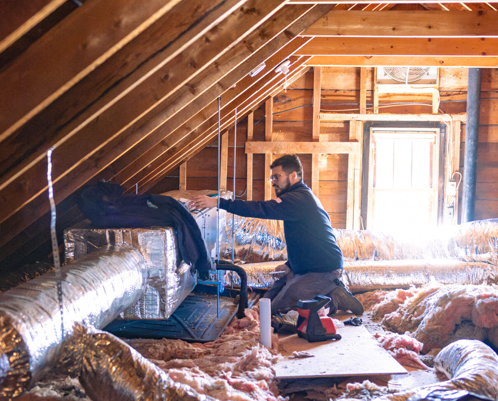 Ductwork installation in the attic of a 1930's Marblehead, MA home