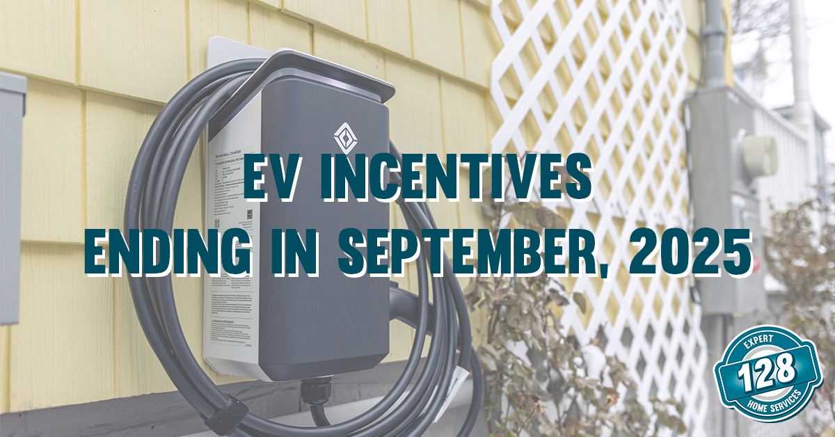 Close-up of an electric vehicle charging station mounted on a yellow house wall, with text stating EV incentives end in September 2025.
