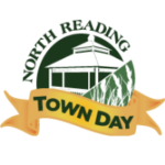 Logo for North Reading Town Day with a gazebo illustration, text reading "North Reading" above and "Town Day" on a yellow ribbon below, with green leaves in the background.