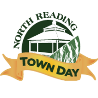 Logo for North Reading Town Day with a gazebo illustration, text reading "North Reading" above and "Town Day" on a yellow ribbon below, with green leaves in the background.