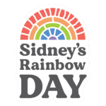 Sticker with a stylized rainbow arch above bold text that reads “Sidney’s Rainbow Day” in gray letters.