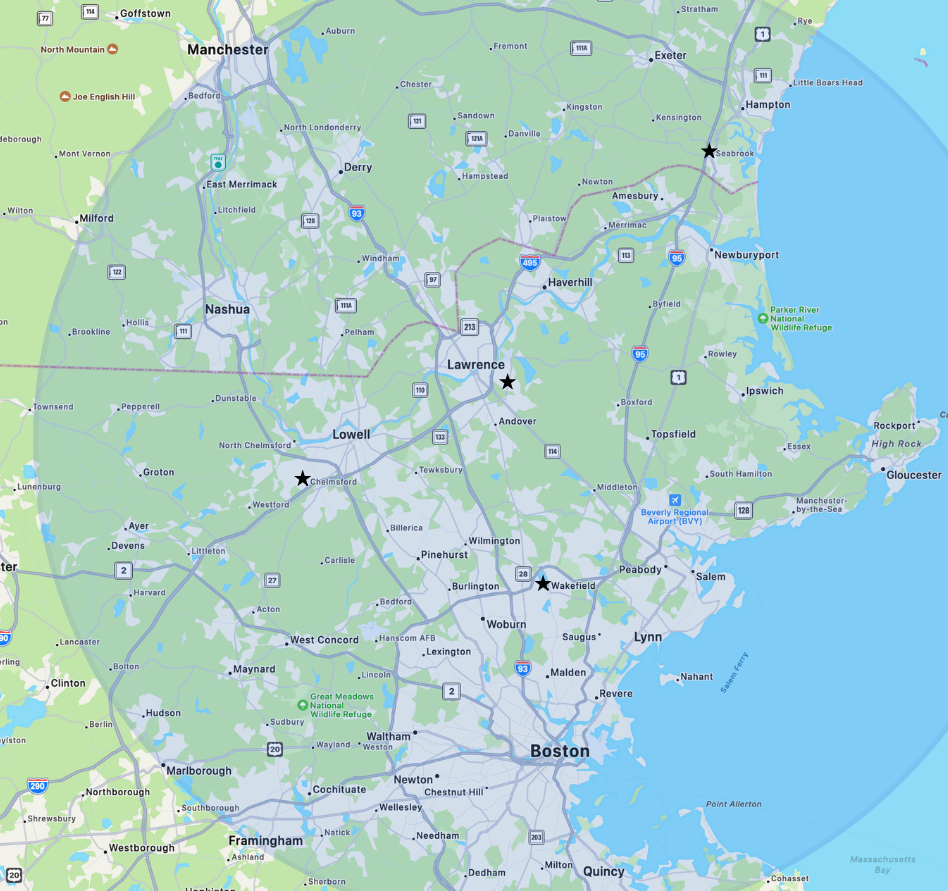 Map showing Boston, Lawrence, and Lowell in Massachusetts, with surrounding cities, highways, and a light blue circular overlay centered near Lawrence.